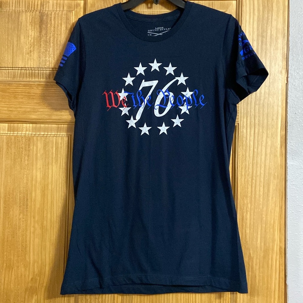 Never worn. Navy blue “we the people” tee